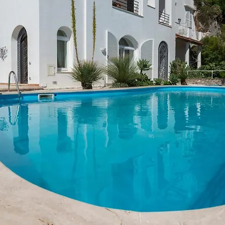 Nanni With Pool Overlooking Faraglioni Rocks